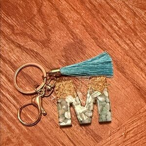 Personalized 'M' Resin Keychain with Blue Tassel - Gold Accent